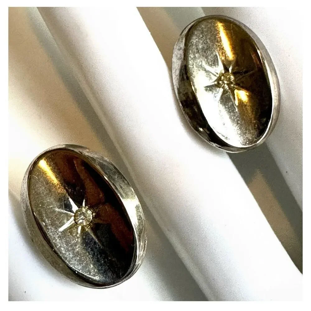 Silver tone oval cufflinks
